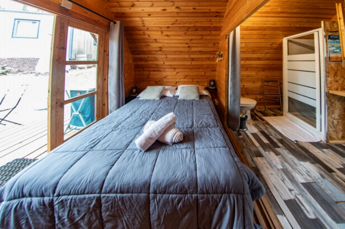 Wooden cabin with bathroom